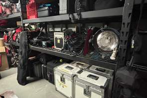 Film equipment stacked on shelves and available to rent from Greenville Production Services