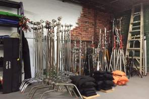 Film equipment placed near a brick wall available from Greenville Production Services
