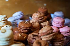 A variety of flavored macarons at Old Europe Coffee & Desserts