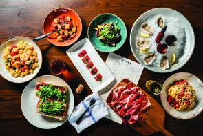 A delectable-looking table full of mouthwatering food at Jianna, an Italian restaurant in downtown Greenville, SC.