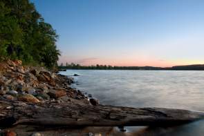A rocky beach at sunset on Lake Hartwell in Clemson, SC.