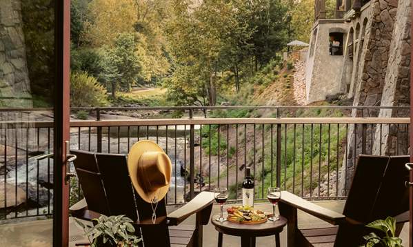 Stunning view of the sunrise from a balcony in the Grand Bohemian Lodge.