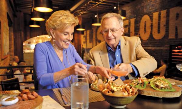 Older Couple Eating at Husk