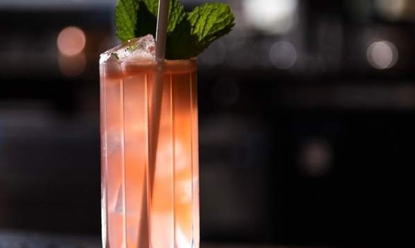A pink cocktails looks tempting at speakeasy Vault & Vator in downtown Greenville, SC.