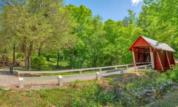 Built in 1909, this is the only remaining covered bridge in South Carolina. From U.S. Hwy 25 north of Travelers Rest, take State Rd 414 through Tigerville. Turn right on Pleasant Hill Rd, right on Campbell's Bridge Rd and travel approximately a quarter-mile to bridge.