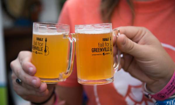 People toasting beer at Fall for Greenville 2017