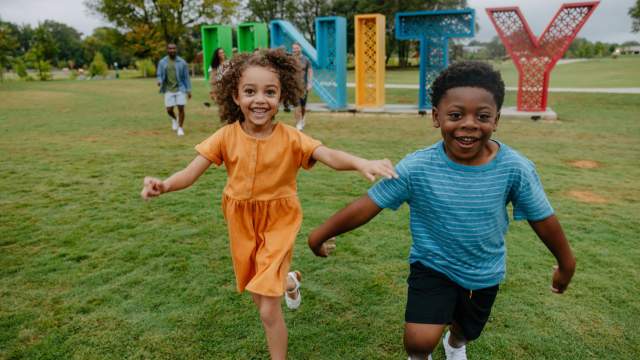 Kids run around in pure joy at Unity Park in downtown Greenville, SC.