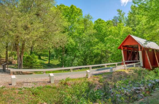 Built in 1909, this is the only remaining covered bridge in South Carolina. From U.S. Hwy 25 north of Travelers Rest, take State Rd 414 through Tigerville. Turn right on Pleasant Hill Rd, right on Campbell's Bridge Rd and travel approximately a quarter-mile to bridge.