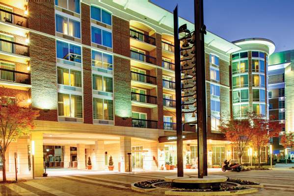 Exterior night view of the Hampton Inn and Suites in Greenville, SC.