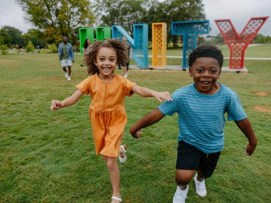 Kids run around in pure joy at Unity Park in downtown Greenville, SC.