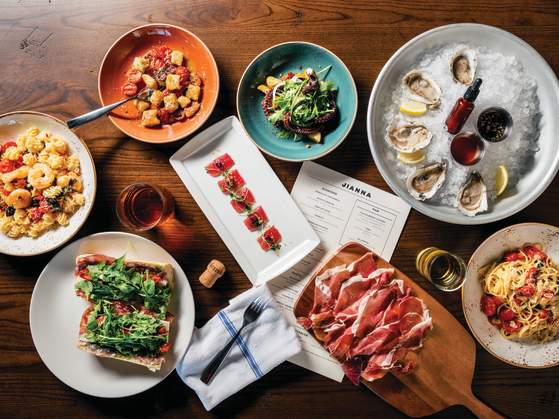 A delectable-looking table full of mouthwatering food at Jianna, an Italian restaurant in downtown Greenville, SC.