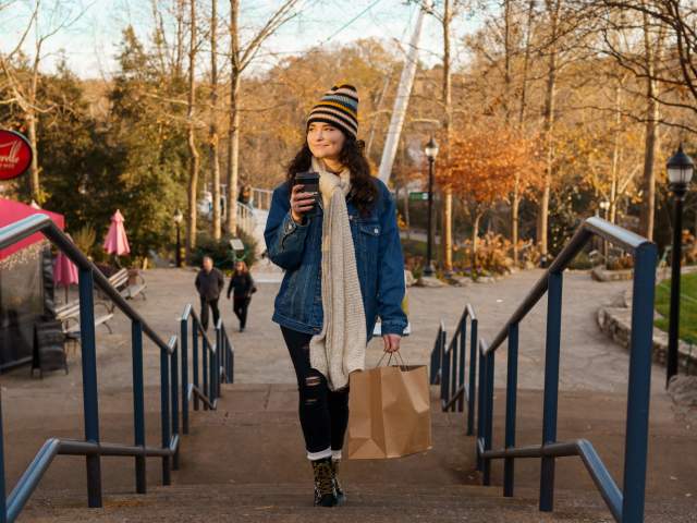Woman Shopping by Passerelle in the fall