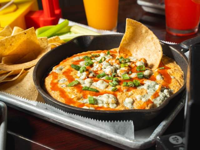 Yummy cheese dip and nachos from Local Cue in Greenville, SC.
