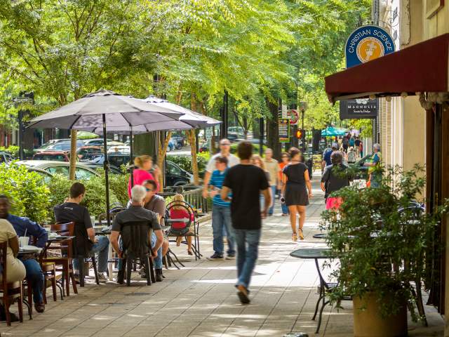 Outdoor dining and shopping on downtown Greenville’s quaint and charming Main Street.