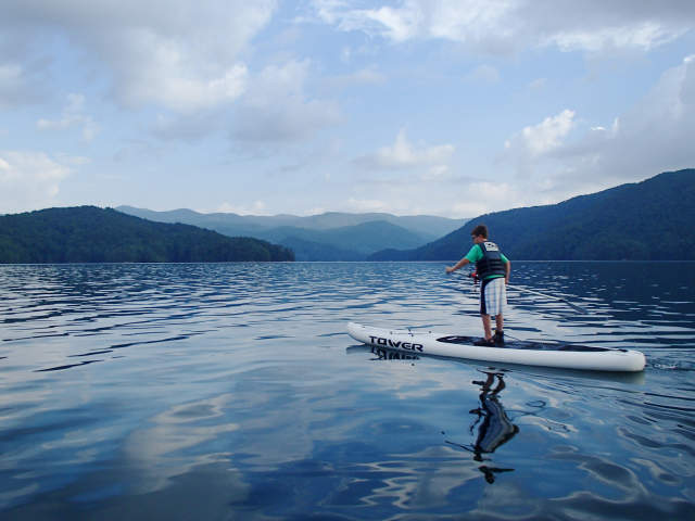 Paddling around the picturesque Lake Jocassee surrounded by the Blue Ridge Mountains on an inflatable SUP