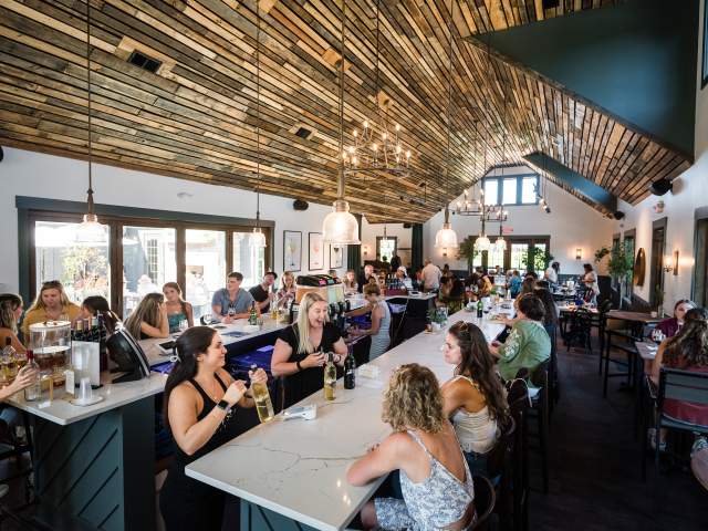 People gathered at the City Scape Winery