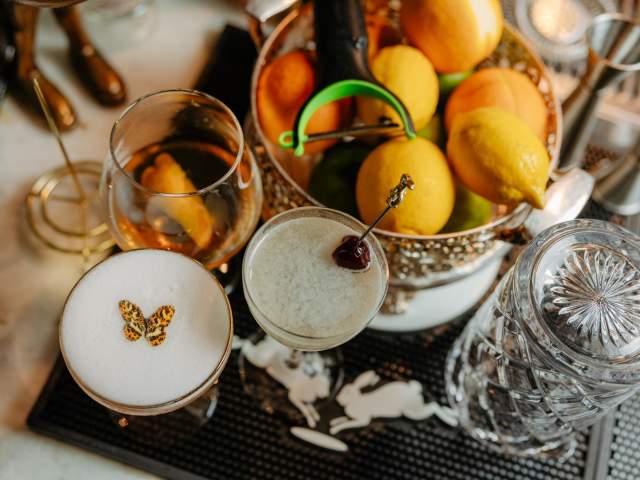 Cocktails on the counter with fruit at The Rabbit Hole in Greenville, SC.