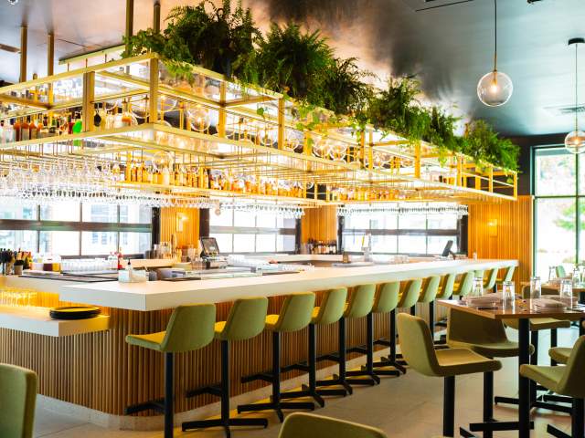 Inside CAMP Modern American Eatery bar space