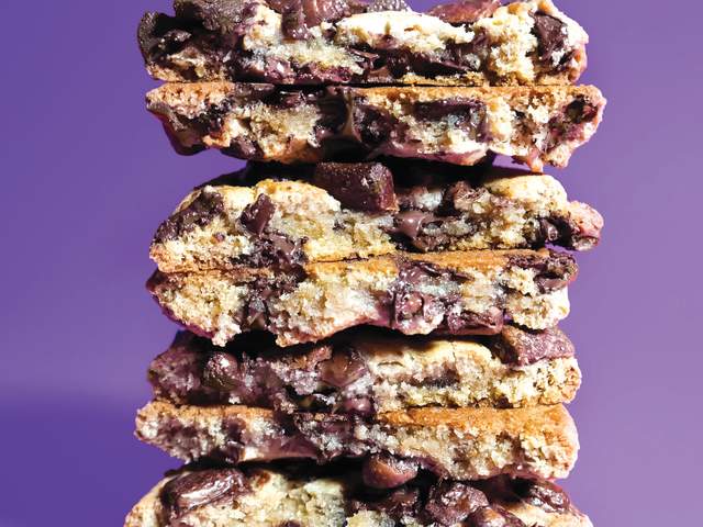 A stack of ooey-gooey, delicious-looking chocolate chip cookies from Insomnia Cookies in Greenville, SC.