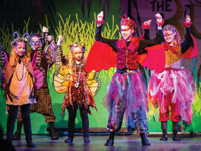 Actors performing at The Logos Theatre