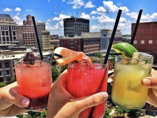 Three fruity cocktails at UP on the Roof in downtown Greenville, SC.