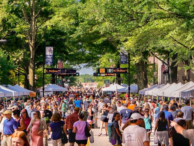 Farmers market vendors and customers at the Saturday Market.