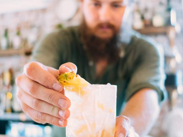 The Anchorage restaurant bartender making cocktail