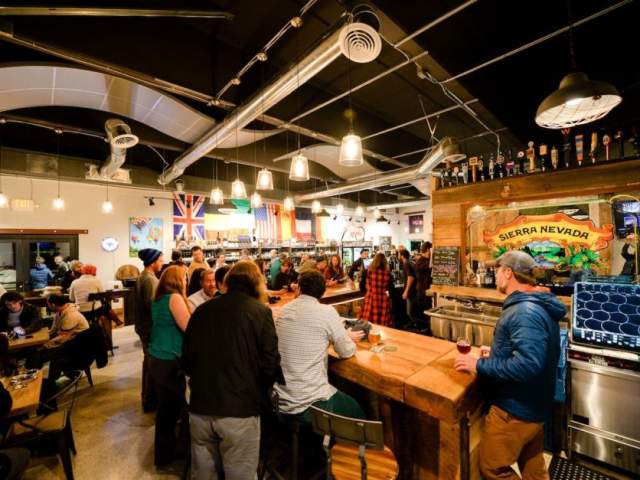 People inside The Community Tap