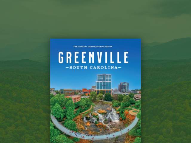 2024 Destination Guide cover with a mountainous view in the background