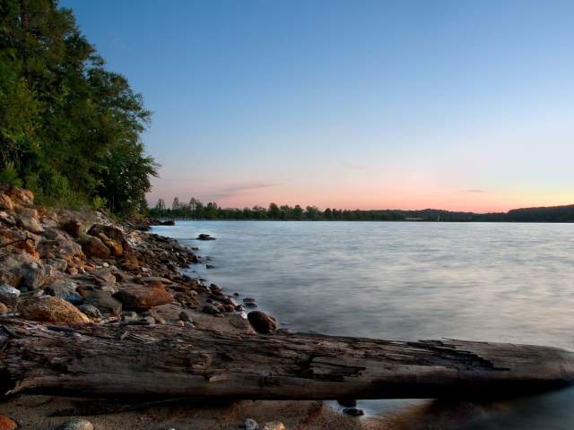 A rocky beach at sunset on Lake Hartwell in Clemson, SC.