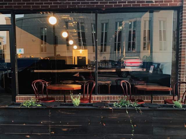 Exterior seating at Swordfish Cocktail Club in downtown Greenville, SC.