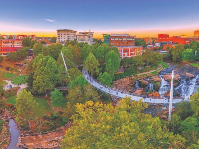 Aerial view of Liberty Bridge at Falls Park at Sunset