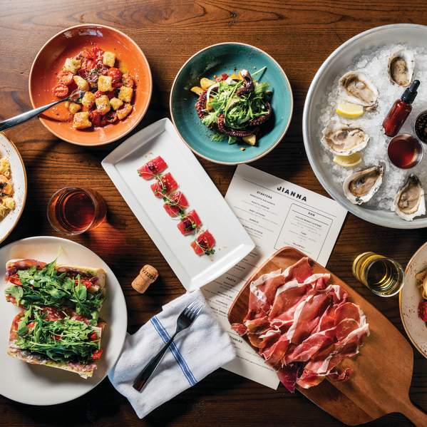 A delectable-looking table full of mouthwatering food at Jianna, an Italian restaurant in downtown Greenville, SC.