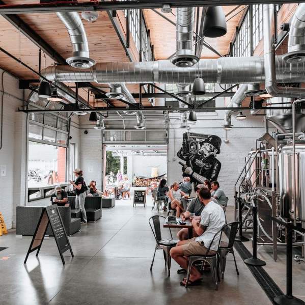 People sitting in Liability Brewing Co.
