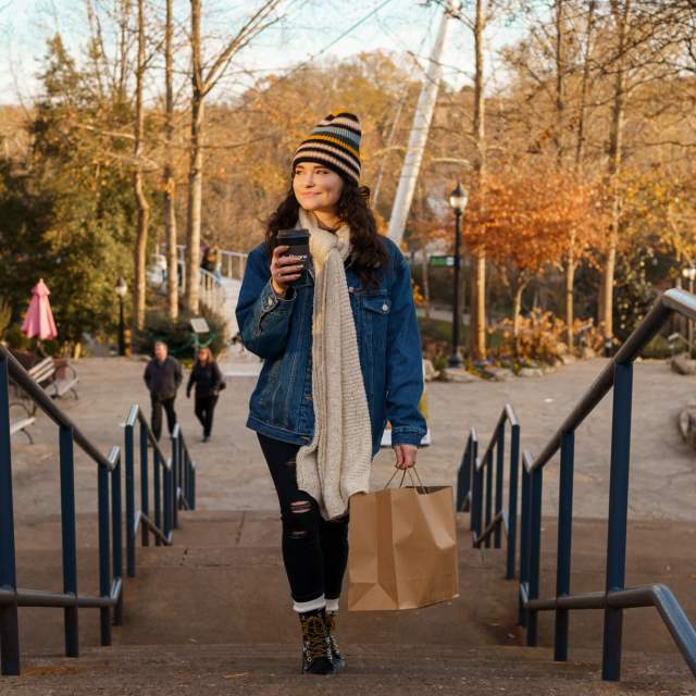Woman Shopping by Passerelle in the fall
