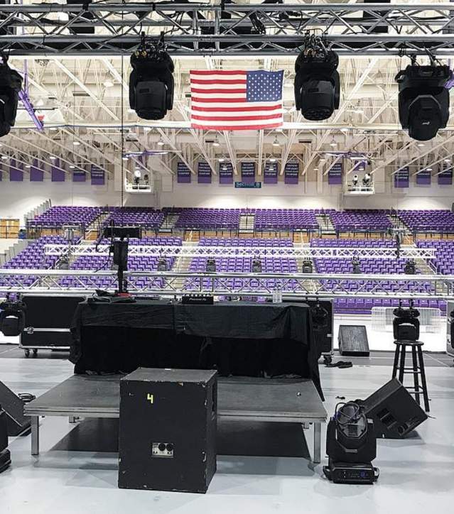 Stage setup at Furman University in a gymnasium setting