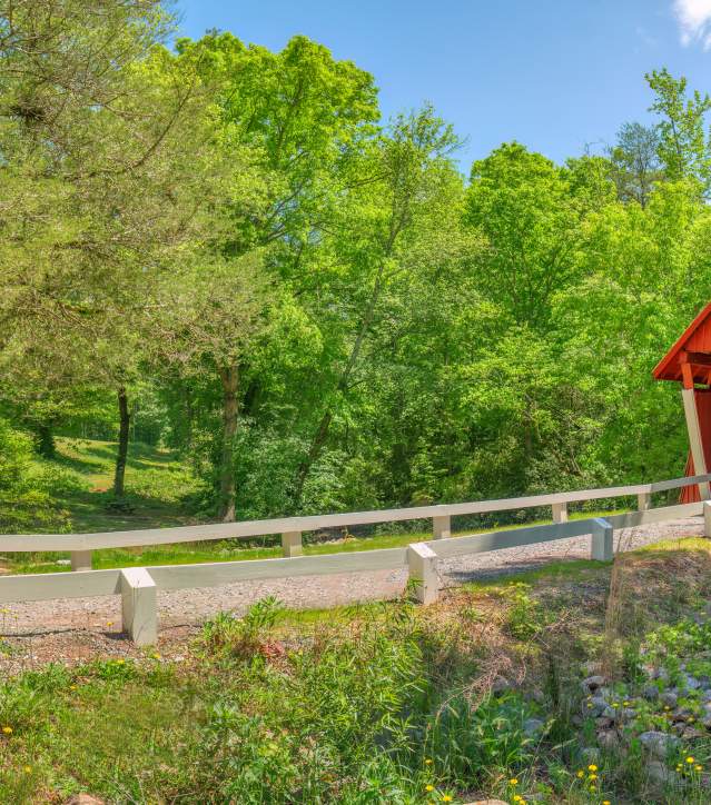 Built in 1909, this is the only remaining covered bridge in South Carolina. From U.S. Hwy 25 north of Travelers Rest, take State Rd 414 through Tigerville. Turn right on Pleasant Hill Rd, right on Campbell's Bridge Rd and travel approximately a quarter-mile to bridge.