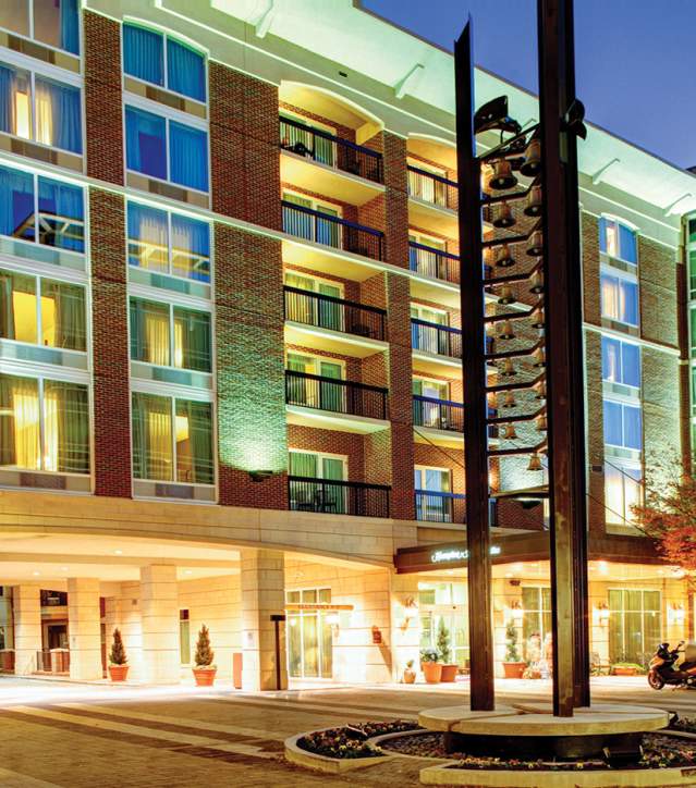 Exterior night view of the Hampton Inn and Suites in Greenville, SC.