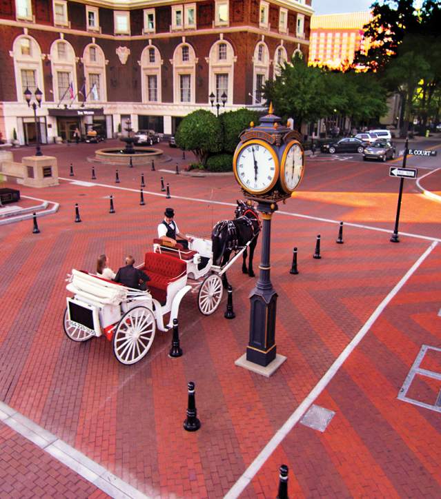 Horse drawn carriage on brick street in Greenville, SC.