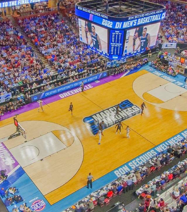 Overhead photo of the crowd attending the Men's NCAA Basketball Tournament in Greenville at Bon Secours Wellness Arena