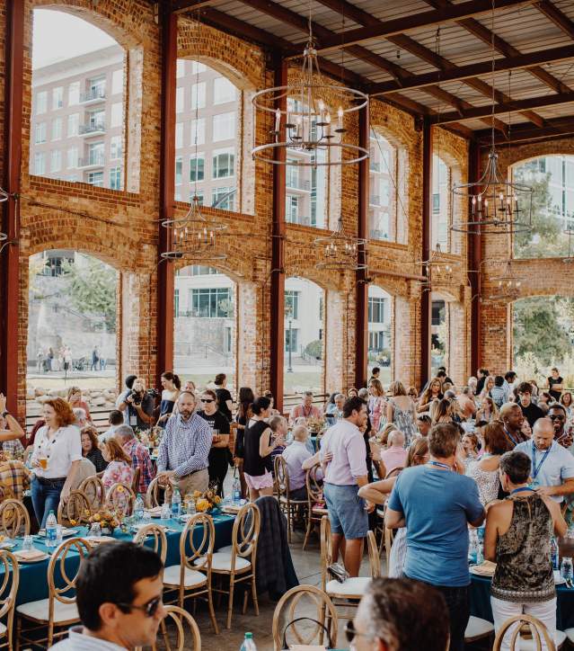 A large group of people attending an event for euphoria, the food & wine festival at Wyche Pavilion in Greenville, SC