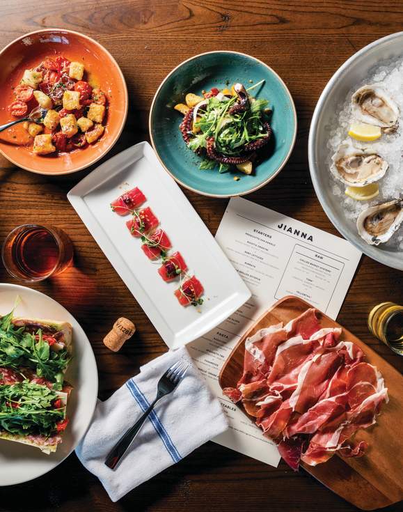 A delectable-looking table full of mouthwatering food at Jianna, an Italian restaurant in downtown Greenville, SC.