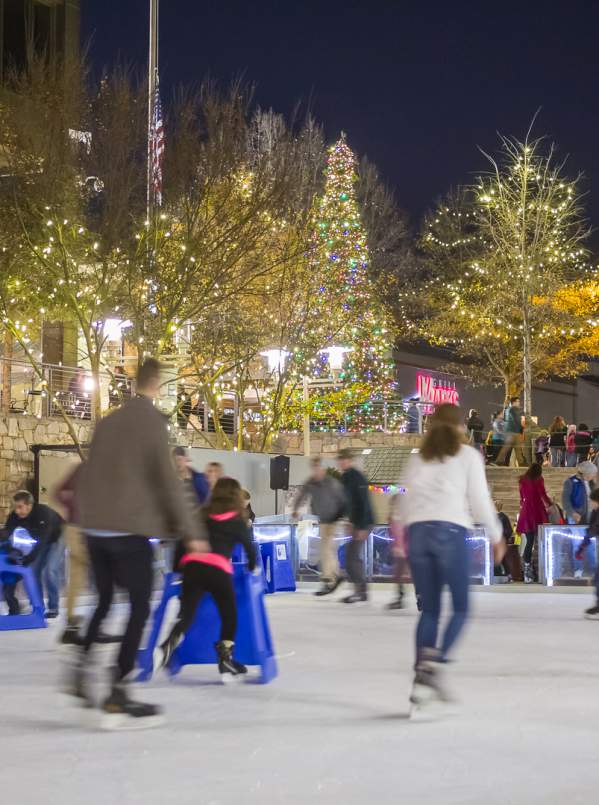Patrons skate outdoors at the United Community Ice on Main rink in downtown Greenville, SC.