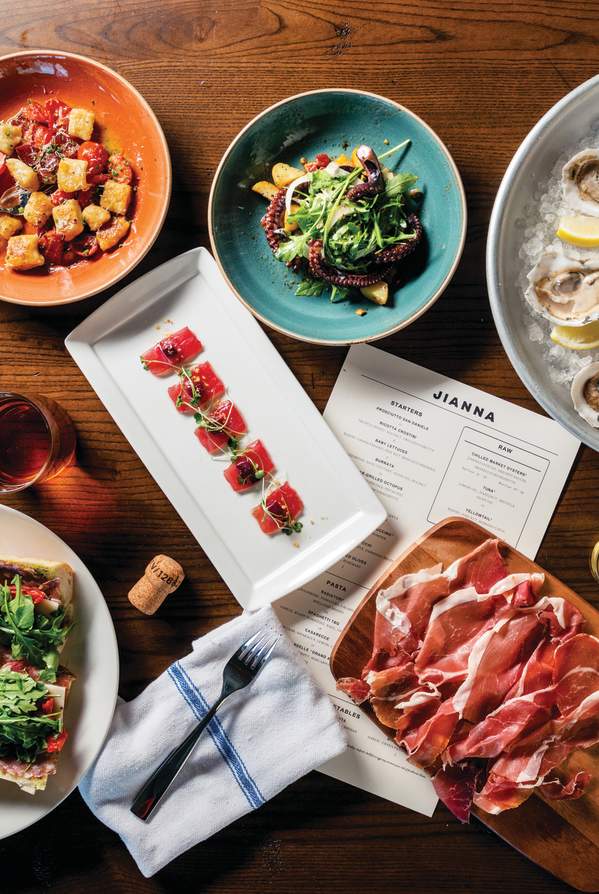 A delectable-looking table full of mouthwatering food at Jianna, an Italian restaurant in downtown Greenville, SC.