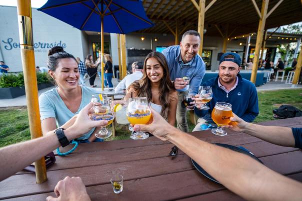 Refreshing beer means smiles all around when it's spent in good company at Southernside Brewery in Greenville, SC.
