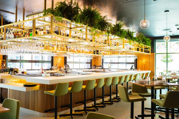 Inside CAMP Modern American Eatery bar space