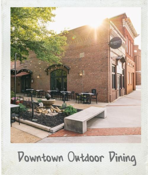 A Polaroid photograph of the exterior of Rick Erwin's Greer in downtown Greer, SC.