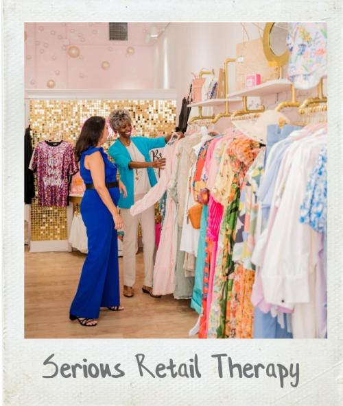 A Polaroid photograph of two women shopping at Sparkling Sisters Champagne Bar & Boutique in downtown Greer, SC.