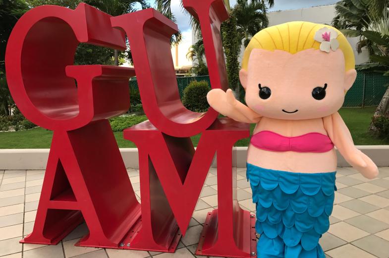 REEF GUAM Letters and Mascot