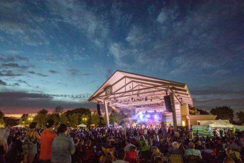 A Crowd Enjoying A Night Concert